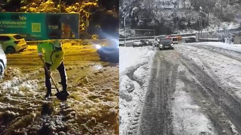 Sarıyer'de polis ekiplerinin karla mücadelesi; kürekle yol açıp araçları ittiler